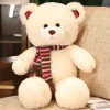 Ours en peluche blanc avec écharpe