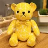 Ours en peluche doudou jaune