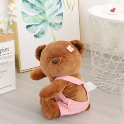 Ours en peluche salopette rose