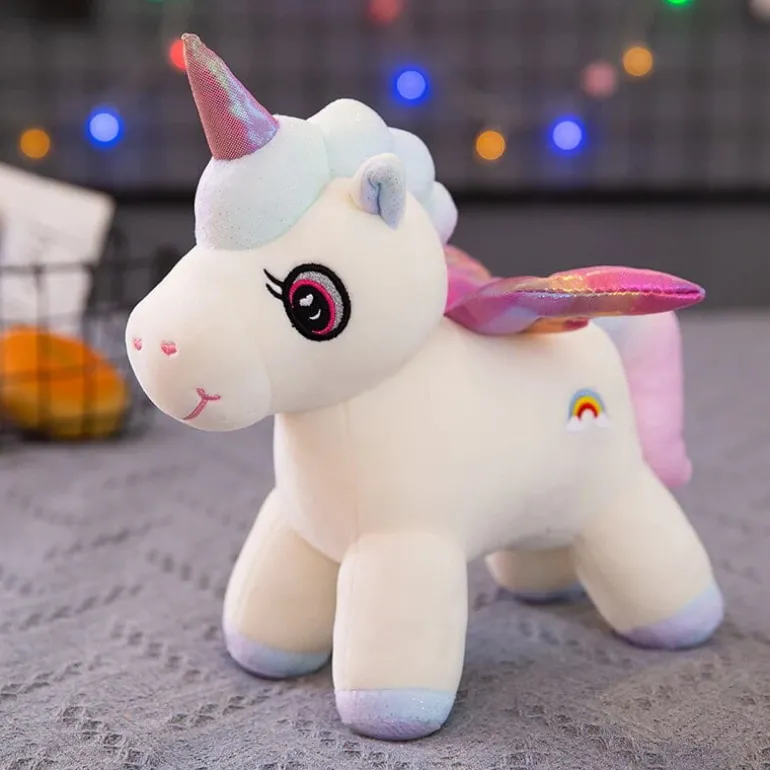 Peluche licorne gros yeux